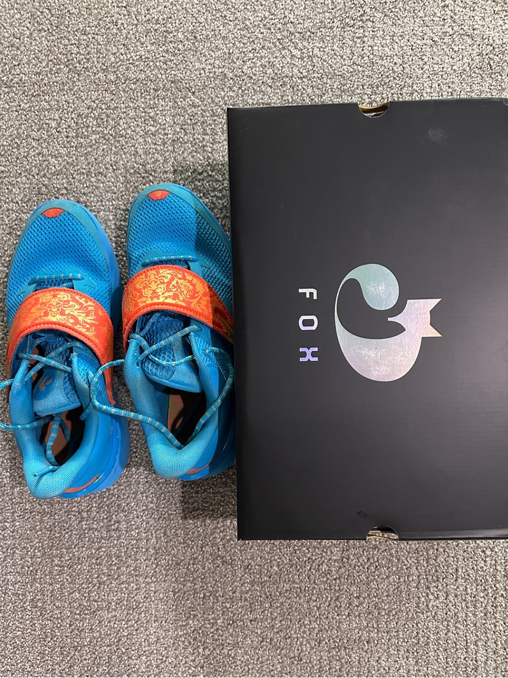 Curry Fox 1 HFD, blue and orange, men’s 9